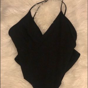 V-neck body suit.